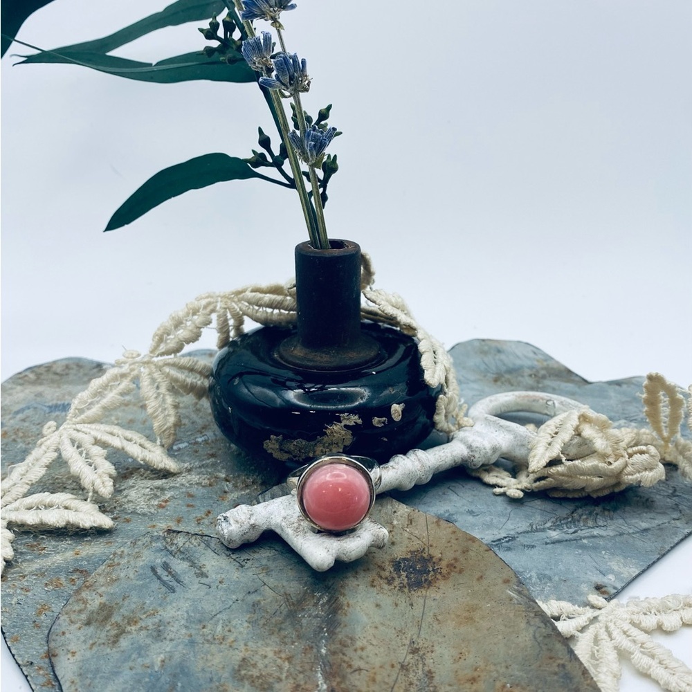 Sterling silver and rose quartz cabochon ring.